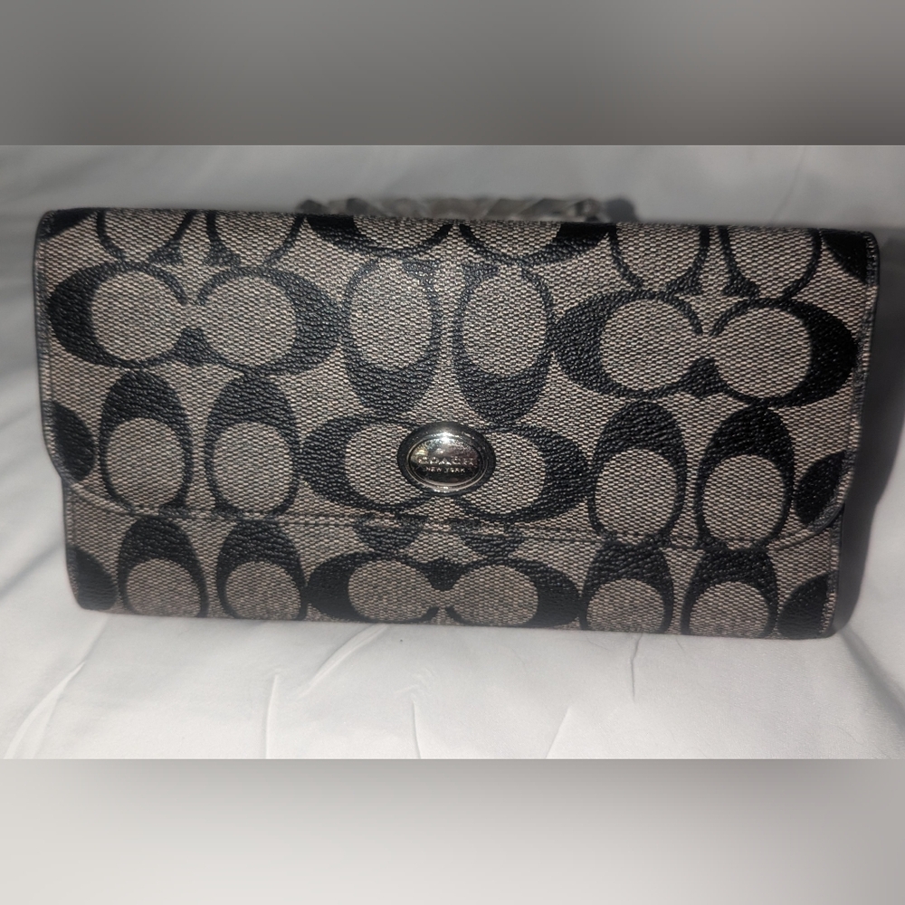 Coach Signature Black and Gray Coated Canvas Tri-Fold Wallet.